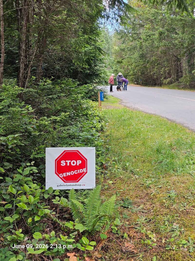 Stop Genocide sign at 231 Malaspina Drive, Gabriola