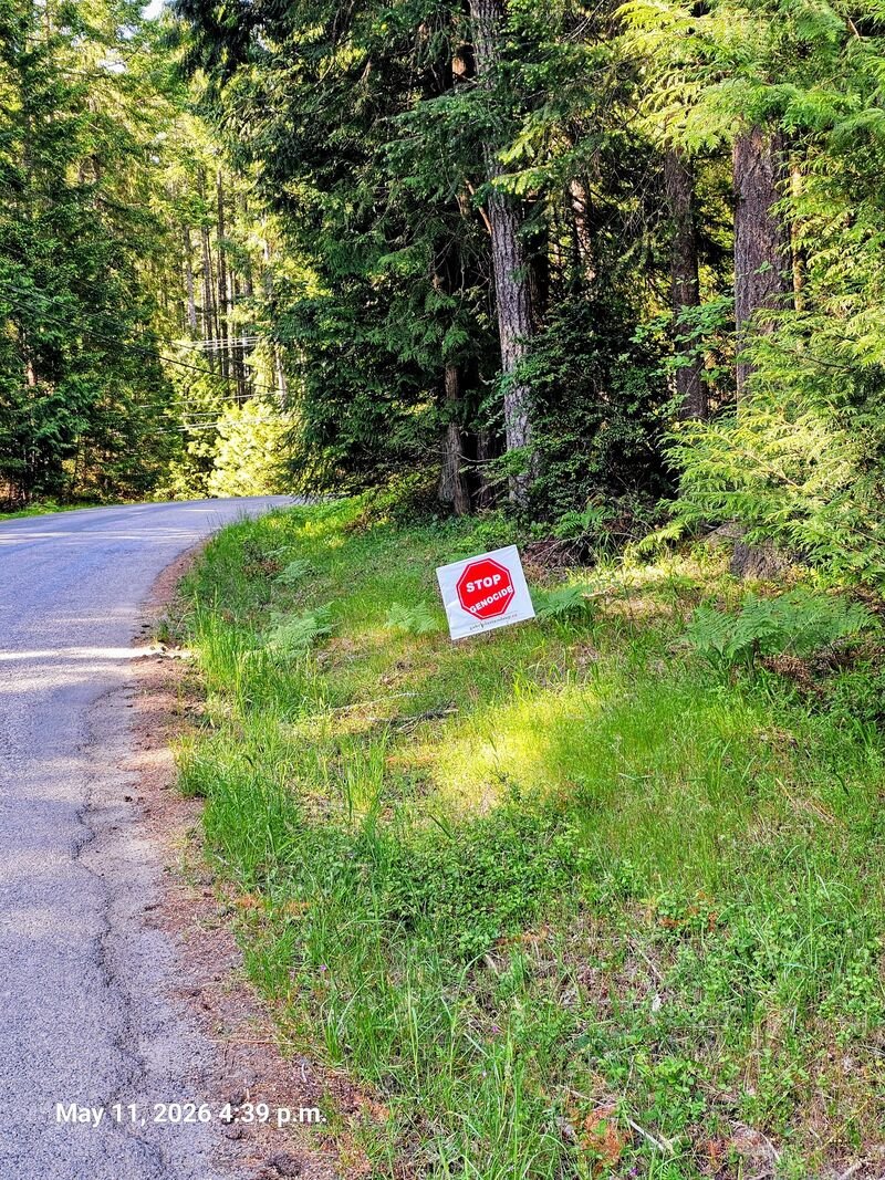 Stop Genocide sign on Bertha Road, Gabriola
