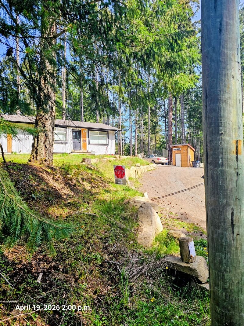 Devon's Stop Genocide sign on South Road, Gabriola